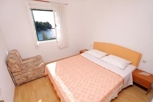 เตียงในห้องที่ Seaside secluded apartments Cove Torac, Hvar - 4044