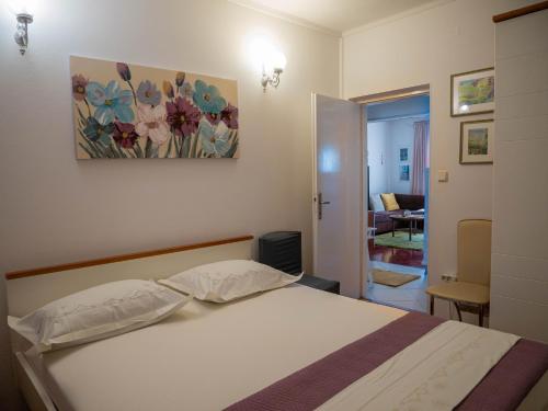 Posteľ alebo postele v izbe v ubytovaní Apartments with a parking space Jelsa, Hvar - 4019