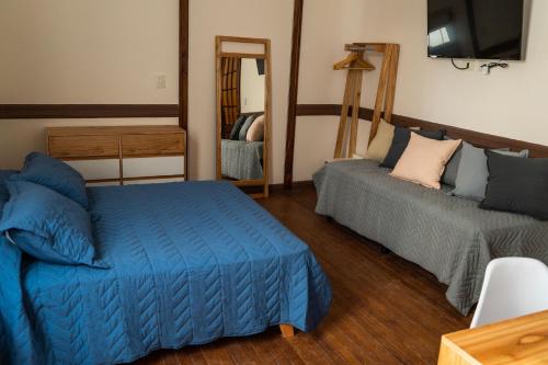 Кровать или кровати в номере Planta Alta BA