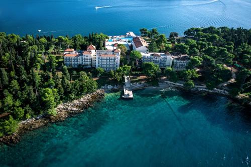 an aerial view of a resort on the water at Maistra Select Island Hotel Katarina in Rovinj