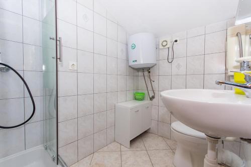 Kúpeľňa v ubytovaní Apartment Slatine 1126b