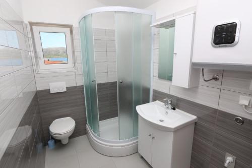 Koupelna v ubytování Apartment Kustici 4086e