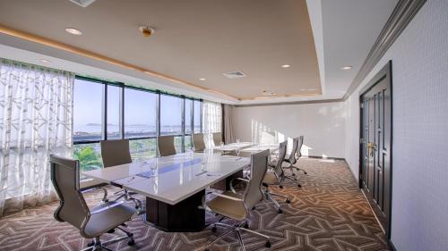 a conference room with a long table and chairs at Intercontinental Miramar Panama by IHG in Panama City