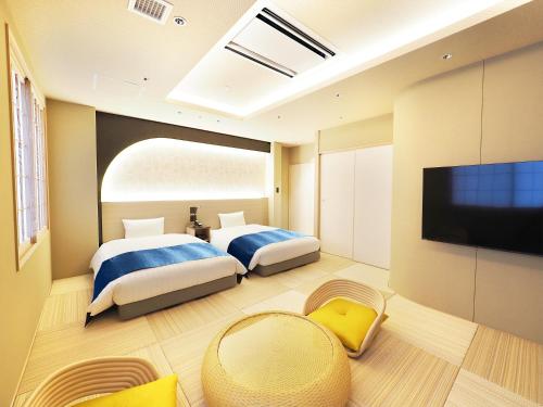 Postel nebo postele na pokoji v ubytování Hotel Abest Grande Takatsuki