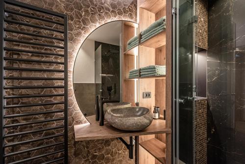 Kylpyhuone majoituspaikassa Deluxe Appartement Arve