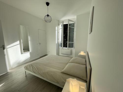 Fotografia z galérie ubytovania Superbe appartement cozy terrasse v destinácii Corbeil-Essonnes