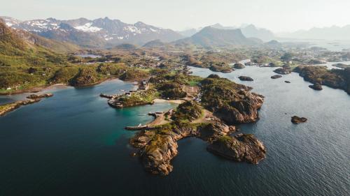 an aerial view of an island in the water at Skårungen - Hotel, Cabins and Camping in Kabelvåg