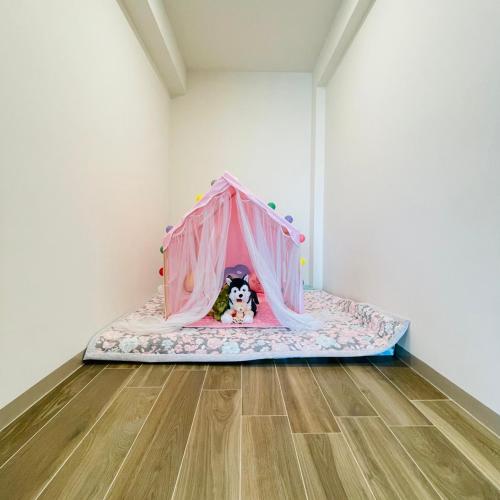 Una cama o camas en una habitación de 戀戀館民宿
