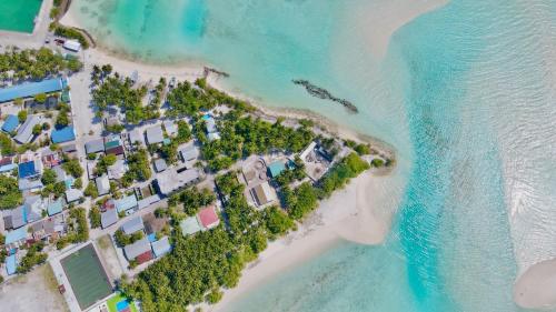 an aerial view of an island in the ocean at Royal Reef Stay in Mathiveri