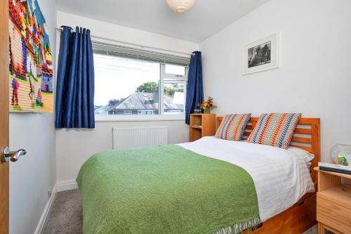 a bedroom with a bed and a window at Finest Retreats - Helm View in Kendal