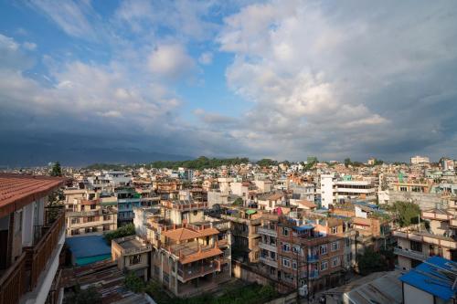 a view of a city with many buildings at Madhuban Hotel in Kathmandu