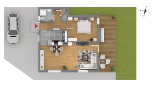 a floor plan of a house with a car at Ferienhaus Schwangau in Schwangau