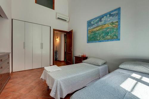 A bed or beds in a room at Ricasoli 17 G