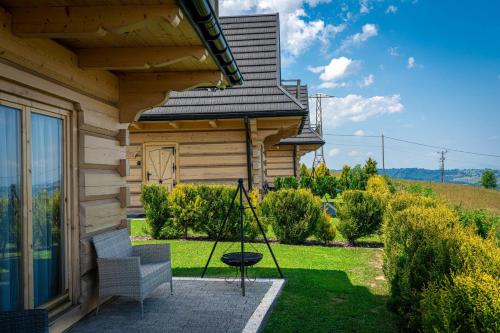 Κήπος έξω από το Domki Górskie Janosik, Kwicoł i Pyzdra Jacuzzi, Sauna