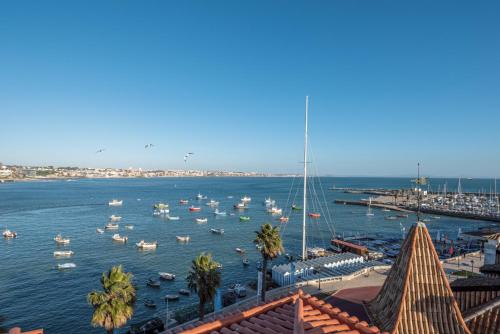 a view of a harbor with boats in the water at Cascais Bay Terrace iv in Cascais