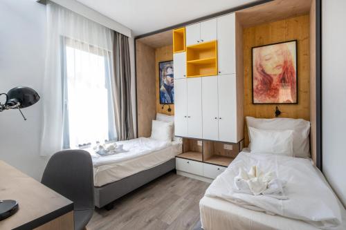 Postel nebo postele na pokoji v ubytování Zsóry Liget Camping & Resort