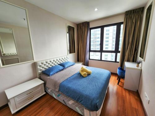 Postel nebo postele na pokoji v ubytování Cozy Suite @ I-City