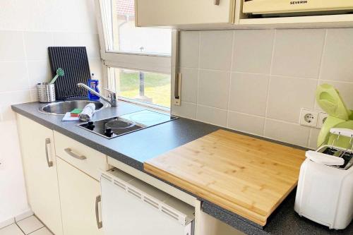 Kuchyň nebo kuchyňský kout v ubytování 1 Zimmer Apartment mit Balkon
