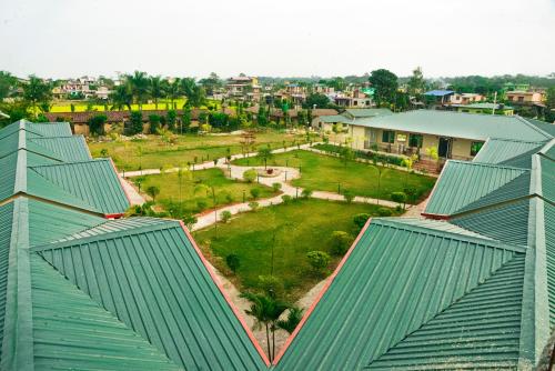 an overhead view of a green roof with a park at Hotel Greenland Safari in Sauraha