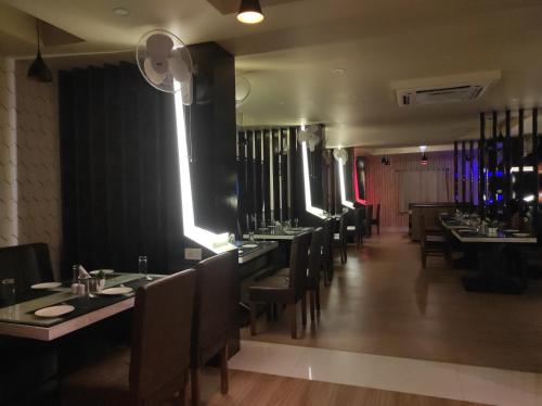 Posezení v ubytování Hotel Paradise - Biswanath Chariali