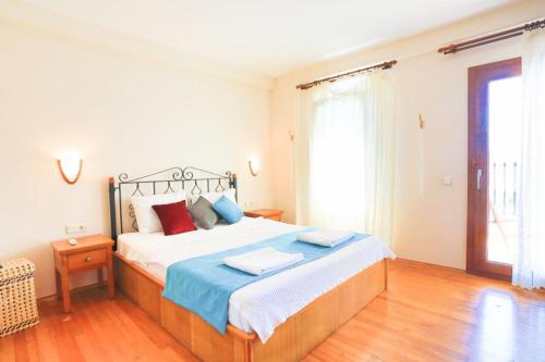 Postel nebo postele na pokoji v ubytování Zeytin Villa