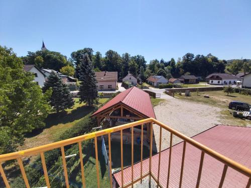 a view of a house from a balcony at Mill House Apartment and Camping in Ljutomer
