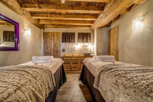 Postel nebo postele na pokoji v ubytování La Maison Rouge