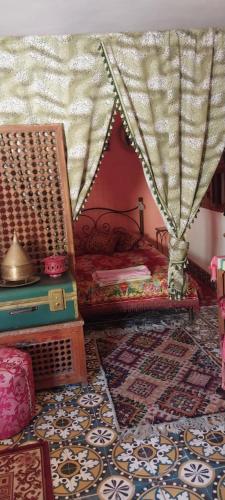 Una cama o camas en una habitación de Riad lala zakia