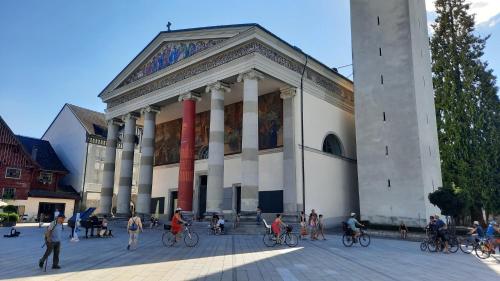 a group of people on bikes in front of a building at Green Hill Apartments - Dornbirn in Dornbirn