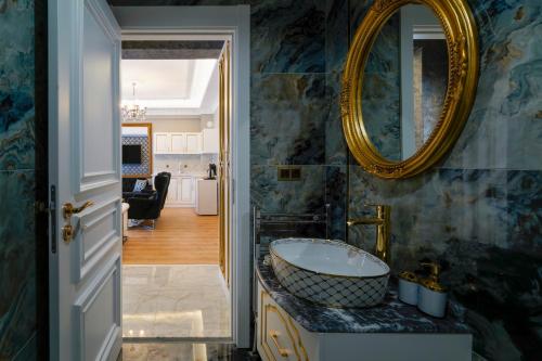 a bathroom with a sink and a mirror at Pearl of Cappadocia in Avanos