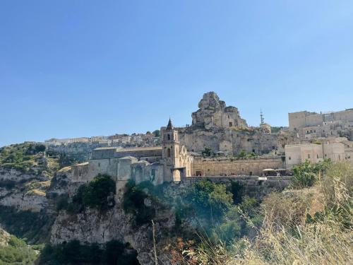 a view of a castle on a mountain at CASA VACANZE BB 164-166 in Matera