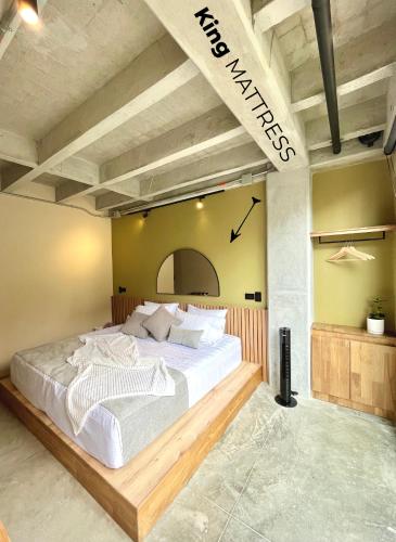 Postel nebo postele na pokoji v ubytování Beminimal Hotel