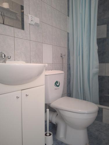 Koupelna v ubytování Piaskowy Domek