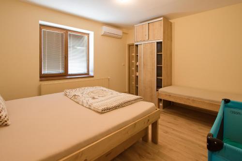 Ένα ή περισσότερα κρεβάτια σε δωμάτιο στο Apartmány Bejby Turnov