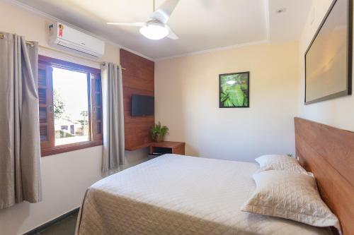 Postel nebo postele na pokoji v ubytování Hotel Imperium Village