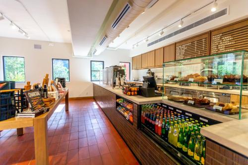 a restaurant with a counter with many bottles of drinks at Enchantment in Sedona