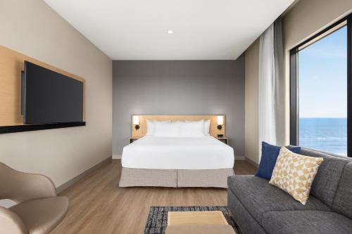 Кровать или кровати в номере Hyatt Place Virginia Beach Oceanfront