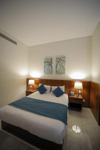 Postel nebo postele na pokoji v ubytování Silotel - Boutique Hotel , Sadat City