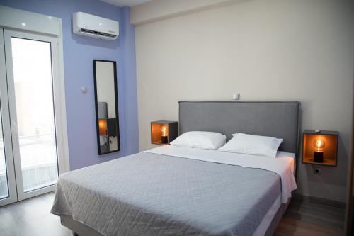 Posteľ alebo postele v izbe v ubytovaní Modern Apartment Downtown Athens