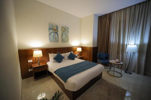 Ένα ή περισσότερα κρεβάτια σε δωμάτιο στο Silotel - Boutique Hotel , Sadat City