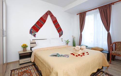 Krevet ili kreveti u jedinici u objektu Traditional Romanian Apartments Old Town City