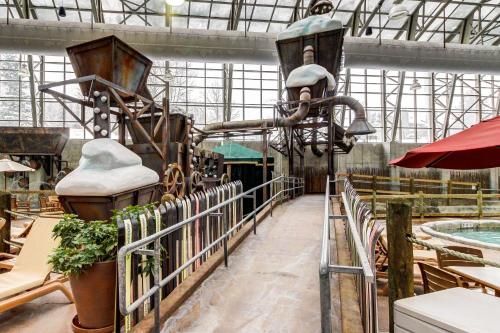 a building with a swimming pool and a water park at Slopeside 705 in Jay