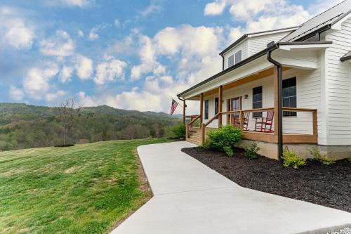 a house with a walkway leading into a yard at Brackens View Retreat in Marshall