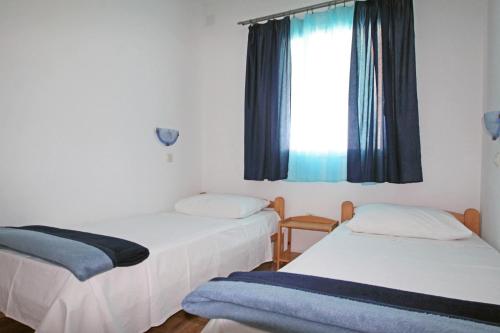 Posteľ alebo postele v izbe v ubytovaní Apartment Vinjerac 5824c