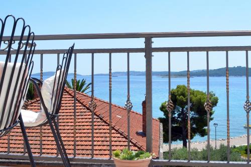 a balcony with a view of the ocean at Apartments by the sea Orebic, Peljesac - 4563 in Orebić