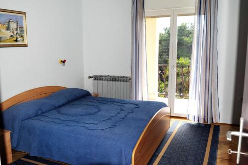 Postel nebo postele na pokoji v ubytování Apartment Zadar - Diklo 5880e