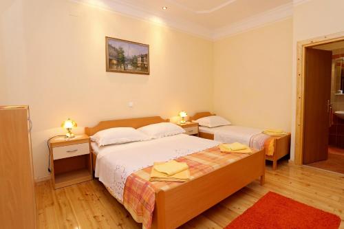 Posteľ alebo postele v izbe v ubytovaní Apartments with parking spaces Orebic, Peljesac - 4527
