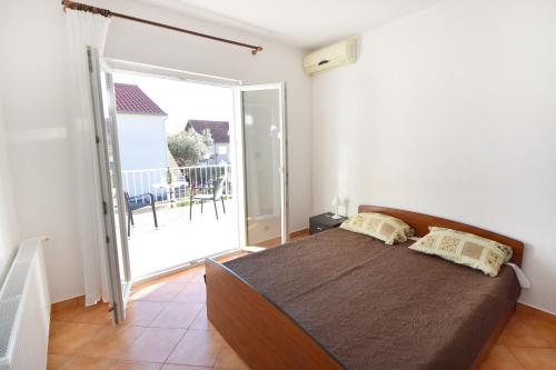 Postel nebo postele na pokoji v ubytování Apartments and rooms by the sea Orebic, Peljesac - 4517