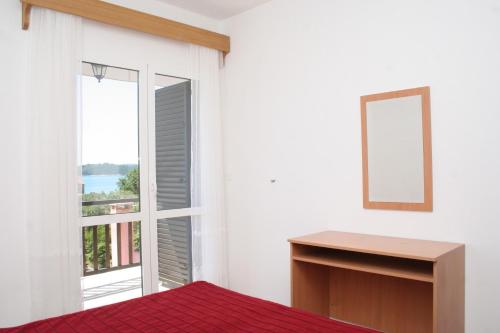Posteľ alebo postele v izbe v ubytovaní Apartment Orebic 4494d