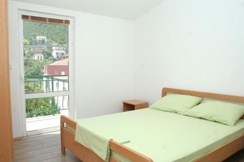 Katil atau katil-katil dalam bilik di Apartments by the sea Trpanj, Peljesac - 4510